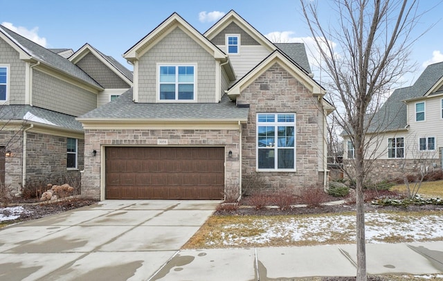 craftsman-style home with a garage