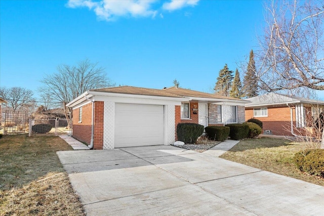 ranch-style house with a garage and a front yard