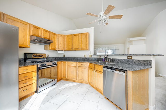 kitchen with ceiling fan, sink, kitchen peninsula, lofted ceiling, and appliances with stainless steel finishes