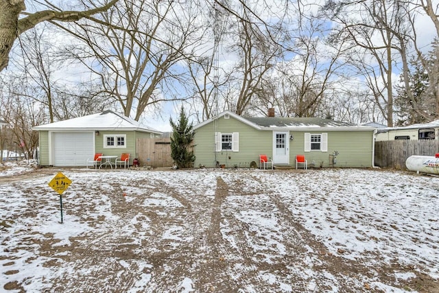 ranch-style house featuring a garage