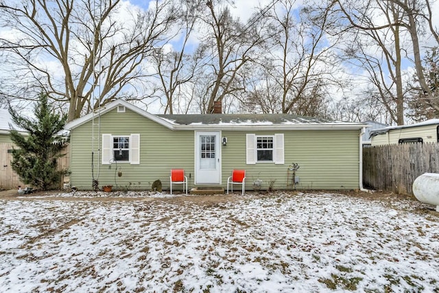 view of snow covered house