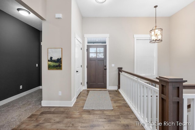 foyer with dark wood-type flooring