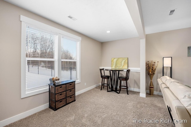 view of carpeted dining area