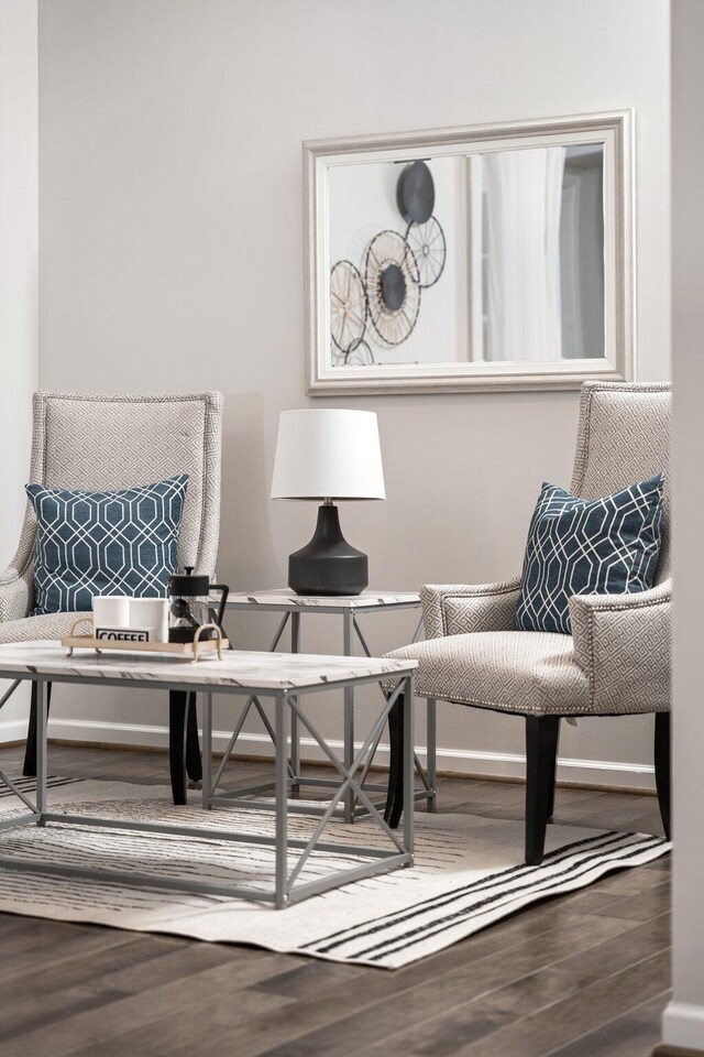 sitting room featuring hardwood / wood-style flooring