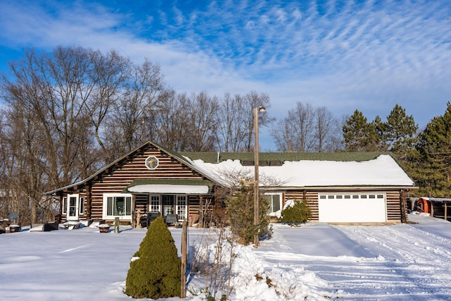 log cabin with a garage