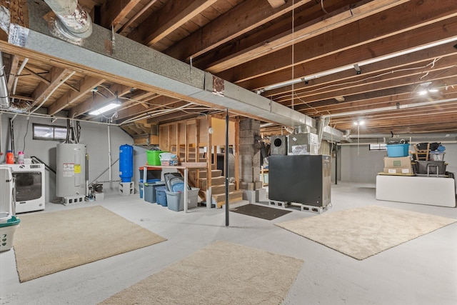 basement featuring electric water heater and heating unit