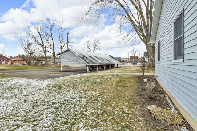 view of yard featuring a carport