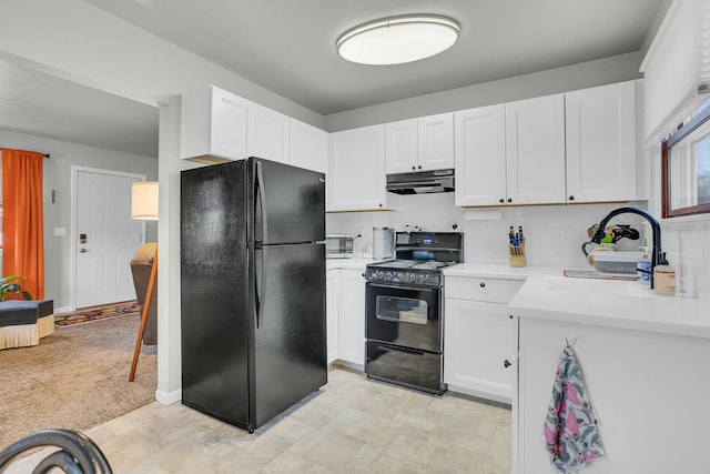 kitchen featuring white cabinetry, sink, tasteful backsplash, light carpet, and black appliances