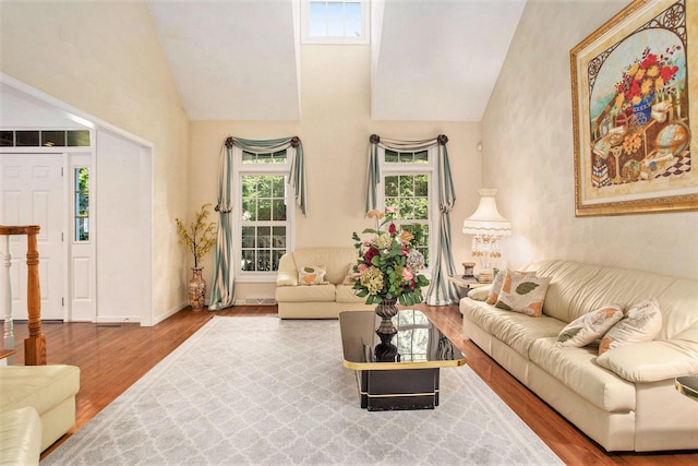 119 Kingsbury Ct, Battle Creek, MI 49015 - living room featuring high vaulted ceiling and hardwood / wood-style flooring