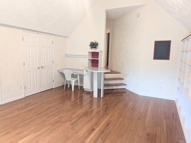 119 Kingsbury Ct, Battle Creek, MI 49015 - interior space with wood-type flooring and vaulted ceiling