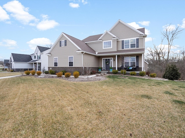 view of front of property featuring a front lawn