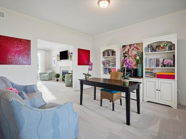 carpeted office with crown molding