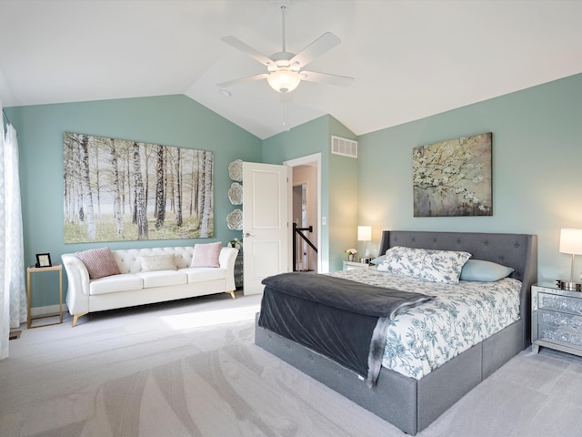 bedroom with light carpet, ceiling fan, and lofted ceiling