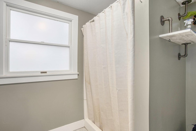 bathroom featuring a wealth of natural light