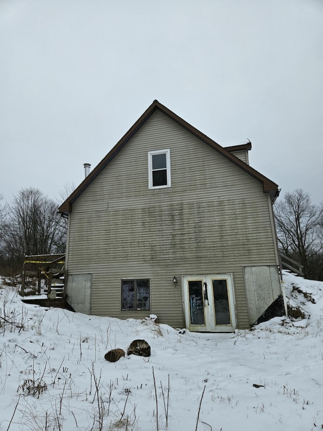 view of snow covered property