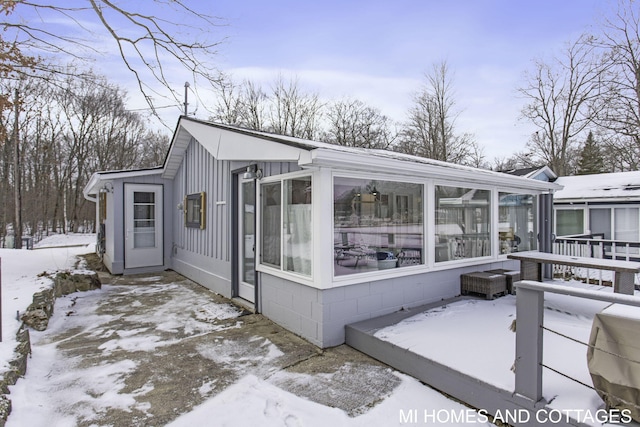 exterior space with a sunroom