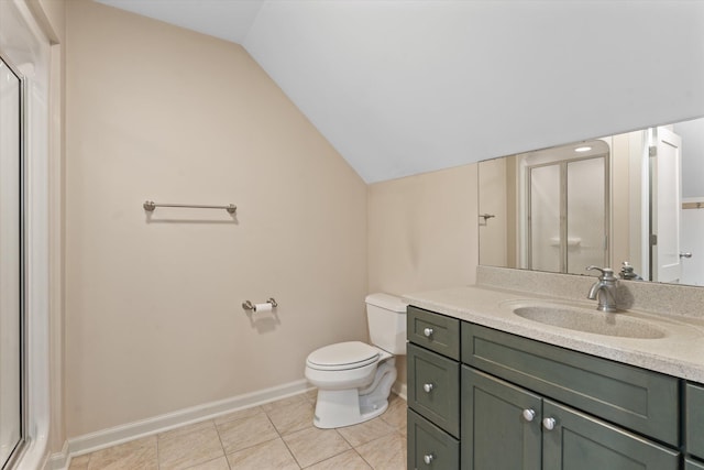 bathroom with tile patterned floors, lofted ceiling, toilet, a shower with door, and vanity