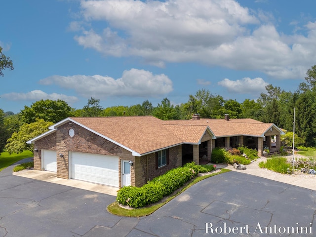 single story home with a garage