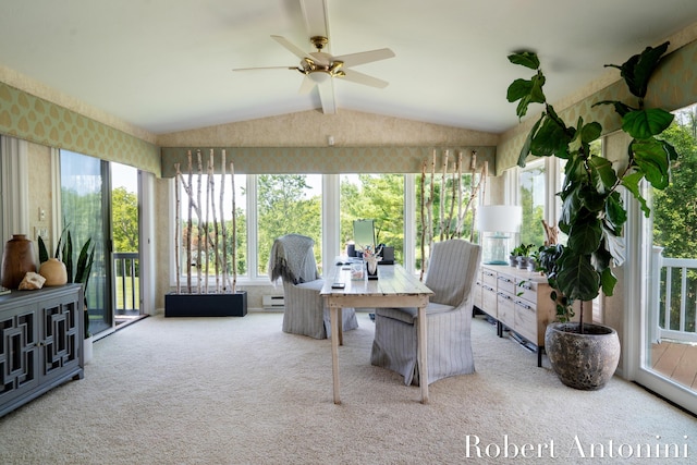 sunroom / solarium featuring ceiling fan and lofted ceiling with beams