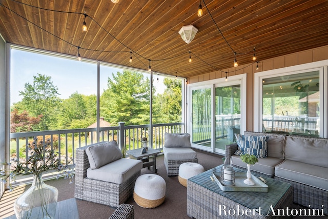 sunroom with wood ceiling