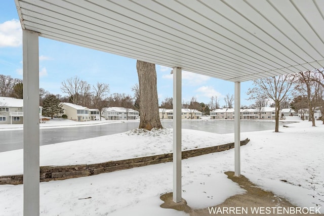 view of yard layered in snow