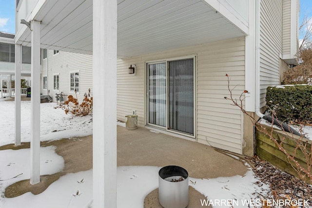 view of snow covered patio