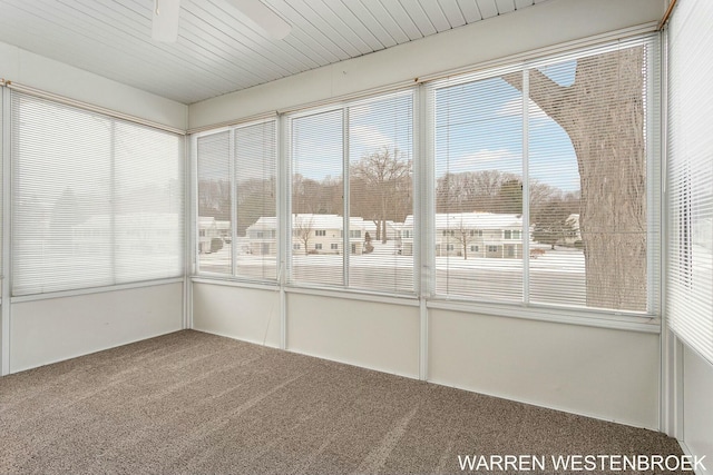 unfurnished sunroom with a healthy amount of sunlight