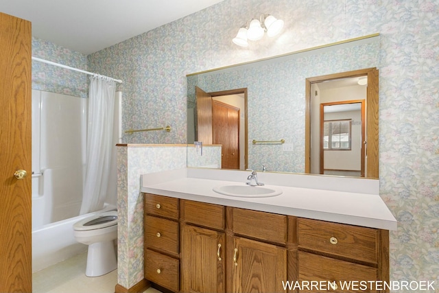 full bathroom featuring shower / bath combo, vanity, and toilet