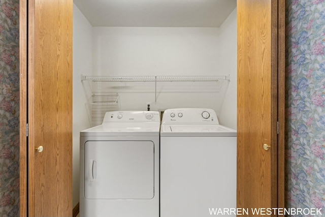 washroom with separate washer and dryer