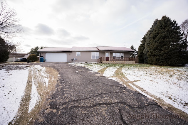 single story home with a garage