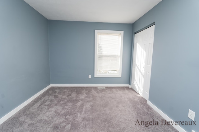 view of carpeted empty room