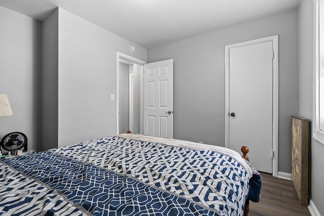 bedroom with hardwood / wood-style floors