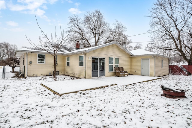 view of snow covered house