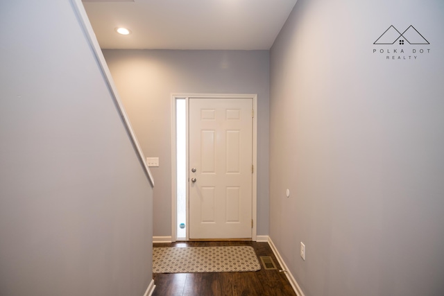 doorway to outside featuring dark hardwood / wood-style flooring