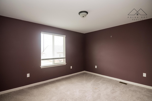 unfurnished room with carpet