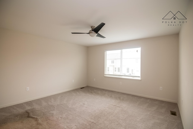 unfurnished room featuring carpet flooring and ceiling fan