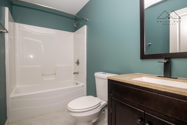 full bathroom with tile patterned flooring, toilet, vanity, and tub / shower combination