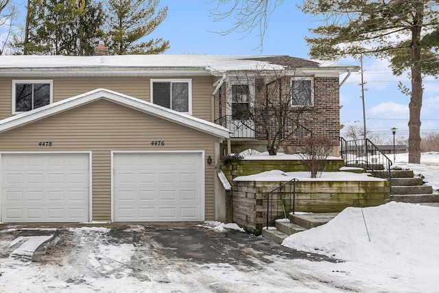 front of property with a garage