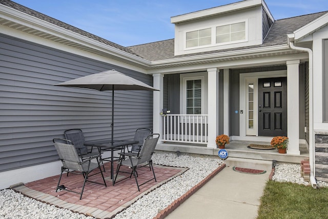 view of patio featuring a porch