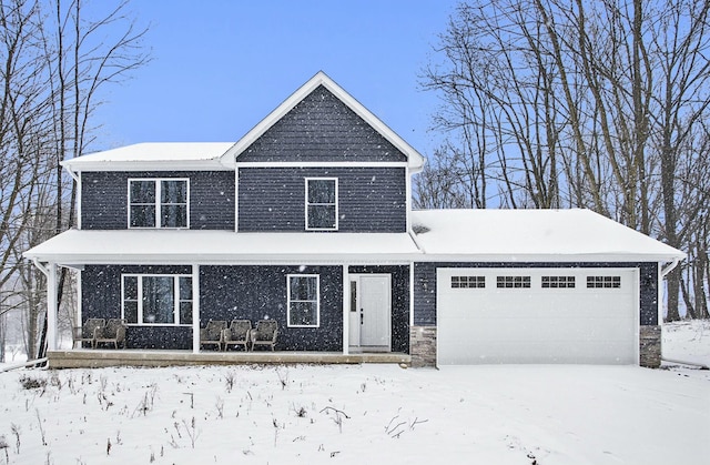 view of front of property with a garage