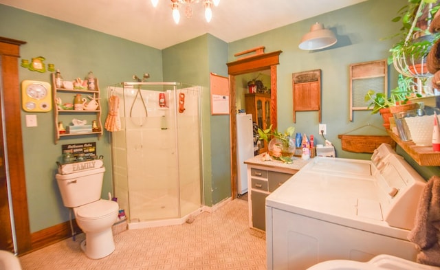 bathroom with vanity, a bidet, toilet, independent washer and dryer, and an enclosed shower