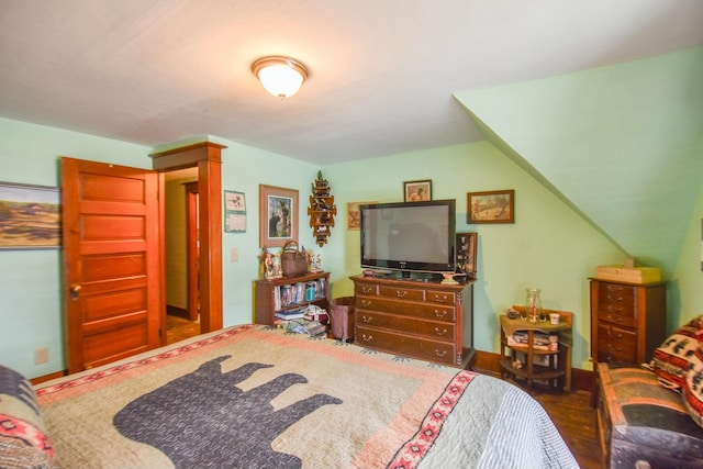 bedroom featuring vaulted ceiling