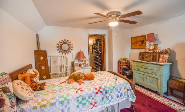 bedroom featuring ceiling fan and lofted ceiling