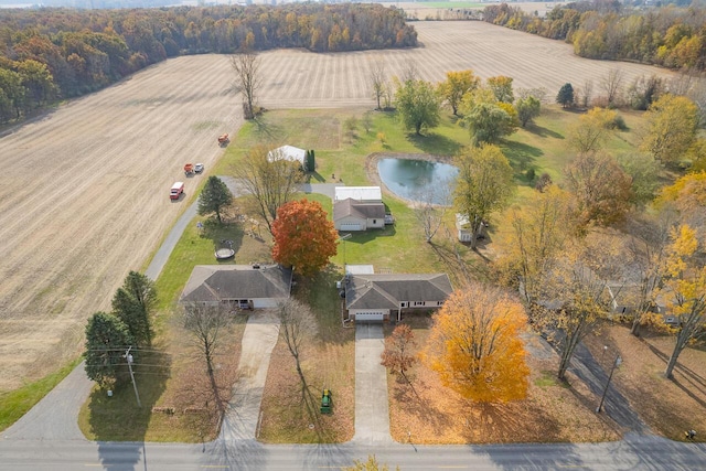 aerial view with a rural view and a water view