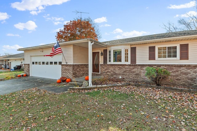 ranch-style home featuring a garage