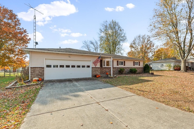 ranch-style house with a front yard and a garage