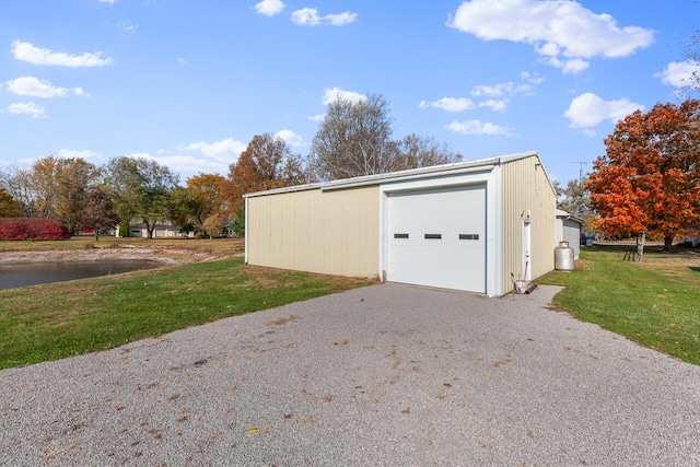 garage with a lawn