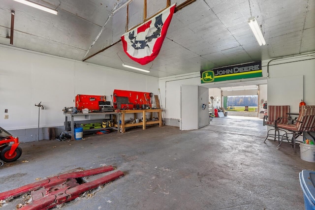 garage with a workshop area