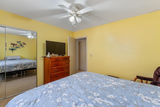 bedroom featuring carpet flooring, a closet, and ceiling fan