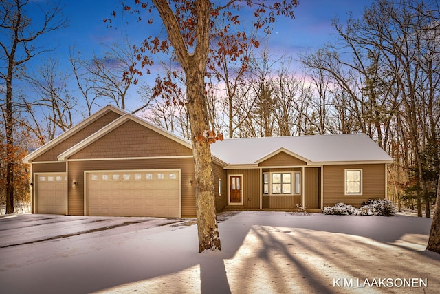 view of front of property featuring a garage